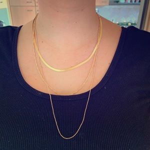 Three tired gold necklace